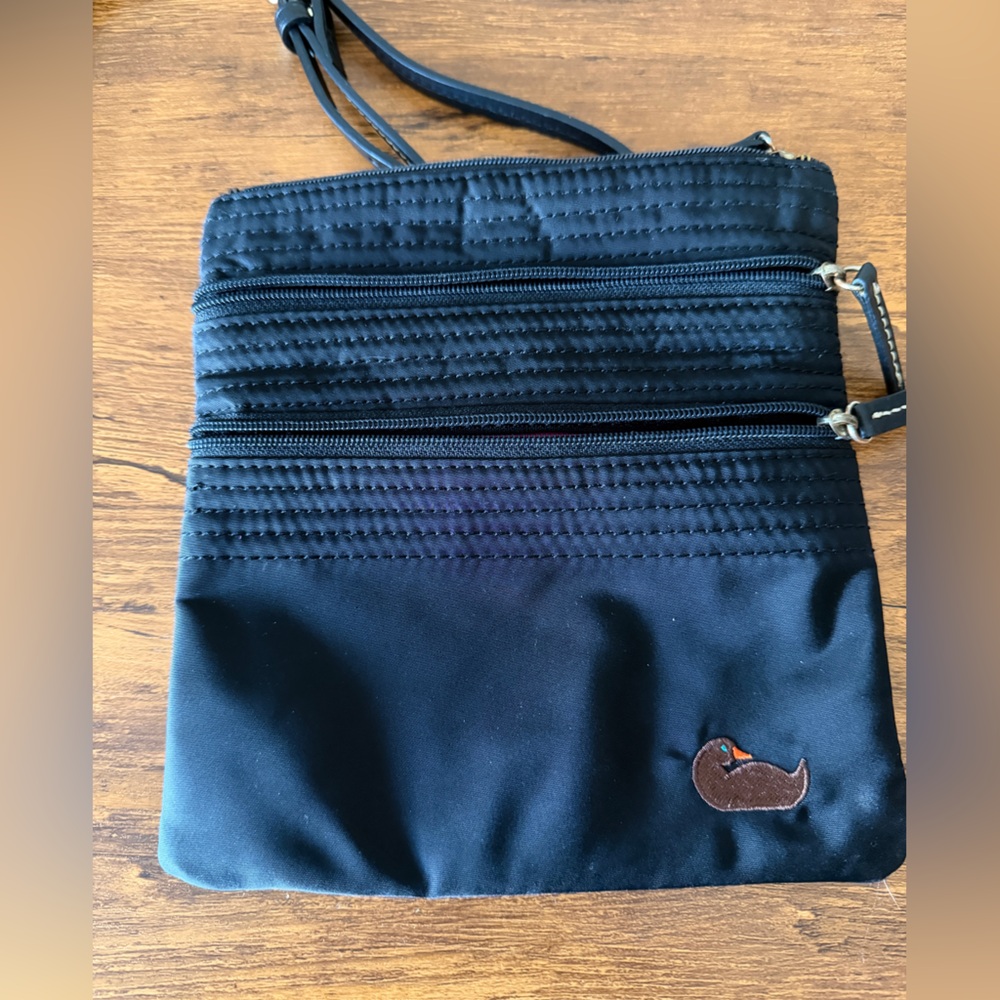 Dooney and Bourke Crossbody Black Bag with Pink Inside and Duck Logo